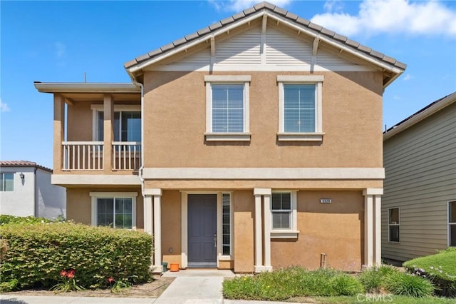 5529 N Valdez, Fresno, CA 93722 - view of front facade with stucco siding and a tile roof