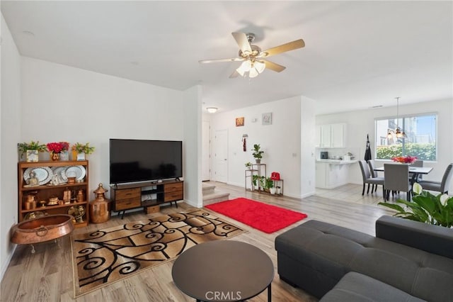 5529 N Valdez, Fresno, CA 93722 - living room featuring light wood-style flooring and a ceiling fan