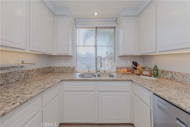 500 Tropea Aisle, Irvine, CA 92606 - kitchen with dishwasher, white cabinetry, light stone counters, and recessed lighting