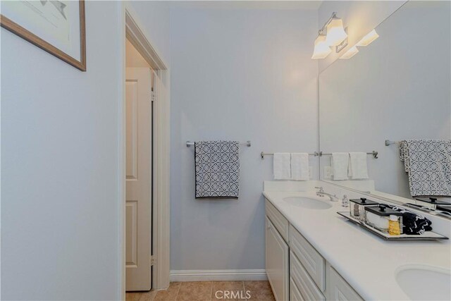 500 Tropea Aisle, Irvine, CA 92606 - full bath featuring double vanity and tile patterned flooring