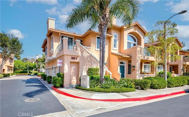 500 Tropea Aisle, Irvine, CA 92606 - view of property featuring a garage