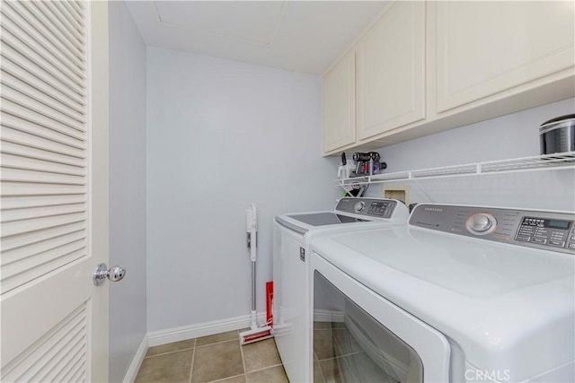 500 Tropea Aisle, Irvine, CA 92606 - washroom featuring cabinet space, washing machine and dryer, and light tile patterned floors
