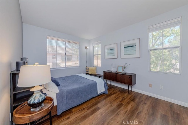 500 Tropea Aisle, Irvine, CA 92606 - bedroom featuring wood finished floors and multiple windows