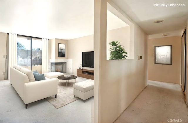 28006 S Western Ave Unit 267, San Pedro, CA 90732 - living area featuring a fireplace and concrete flooring