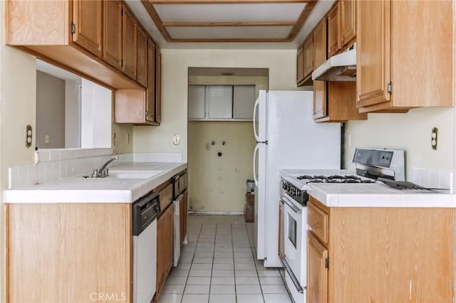 28006 S Western Ave Unit 267, San Pedro, CA 90732 - kitchen featuring white appliances, under cabinet range hood, light countertops, and light tile patterned floors
