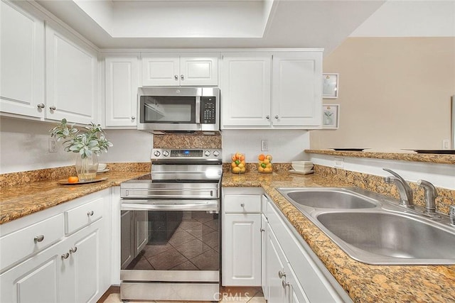 64 N Mar Vista Ave Unit 231, Pasadena, CA 91106 - kitchen with stainless steel appliances, white cabinets, and light countertops