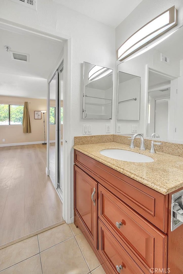 64 N Mar Vista Ave Unit 231, Pasadena, CA 91106 - bathroom featuring tile patterned floors and vanity