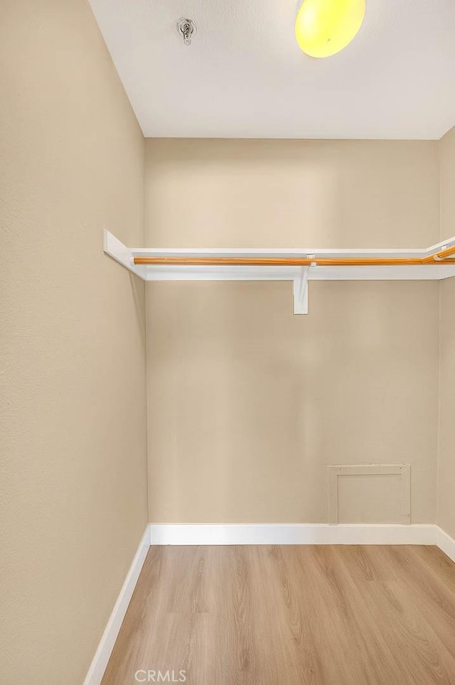 64 N Mar Vista Ave Unit 231, Pasadena, CA 91106 - spacious closet featuring wood finished floors