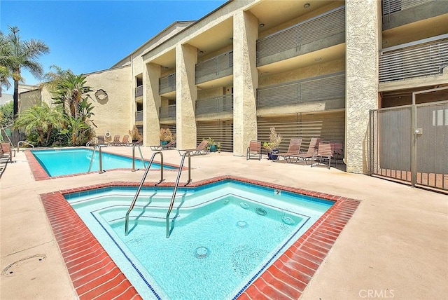 64 N Mar Vista Ave Unit 231, Pasadena, CA 91106 - community pool featuring a hot tub and a patio