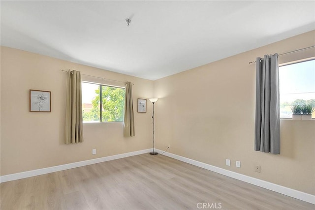 64 N Mar Vista Ave Unit 231, Pasadena, CA 91106 - unfurnished room with light wood-type flooring and baseboards