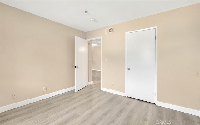 64 N Mar Vista Ave Unit 231, Pasadena, CA 91106 - unfurnished bedroom featuring light wood finished floors