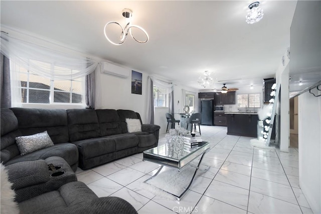 3219 E 6th St, Los Angeles, CA 90023 - living area with a wall mounted AC, light marble finish floors, and a ceiling fan