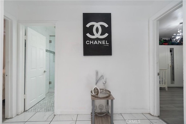 3219 E 6th St, Los Angeles, CA 90023 - corridor with light marble finish flooring