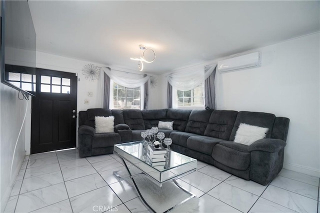 3219 E 6th St, Los Angeles, CA 90023 - living room with a wall unit AC and light marble finish flooring