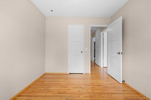 3833 Tomahawk Ln, San Diego, CA 92117 - empty room featuring light wood finished floors and baseboards