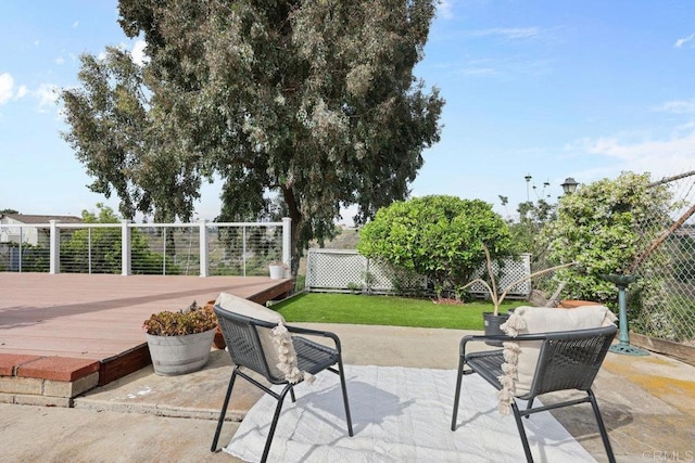 3833 Tomahawk Ln, San Diego, CA 92117 - fenced backyard with a deck and a patio