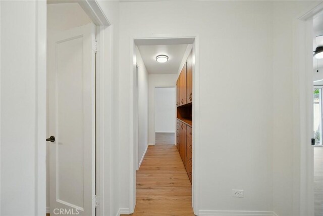 185 N Rodecker Dr, Azusa, CA 91702 - corridor with light wood finished floors and baseboards
