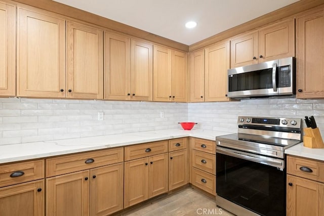 27111 Crews Hill Dr, Menifee, CA 92586 - kitchen with stainless steel appliances, backsplash, recessed lighting, and light stone countertops