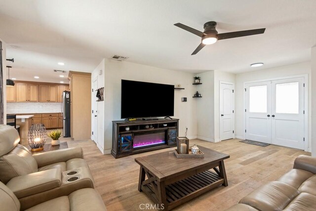 27111 Crews Hill Dr, Menifee, CA 92586 - living room featuring a ceiling fan, light wood-style floors, and recessed lighting