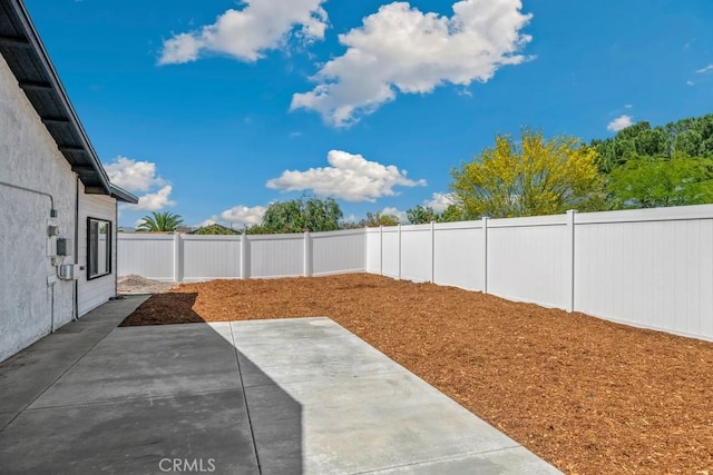 27111 Crews Hill Dr, Menifee, CA 92586 - fenced backyard with a patio area