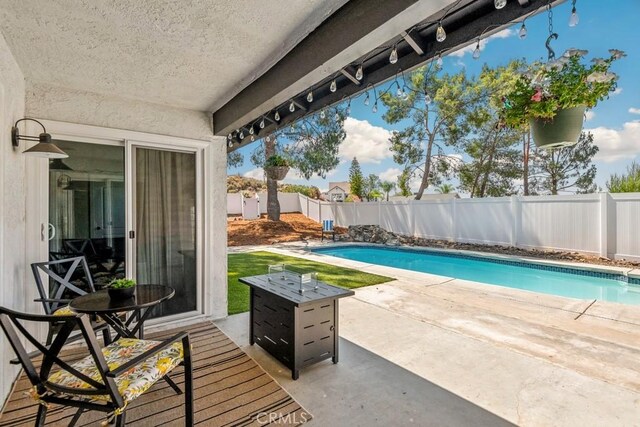 27111 Crews Hill Dr, Menifee, CA 92586 - view of swimming pool featuring a patio and a fenced backyard