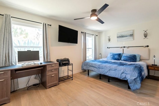 27111 Crews Hill Dr, Menifee, CA 92586 - bedroom featuring light wood-style flooring, a desk, and a ceiling fan