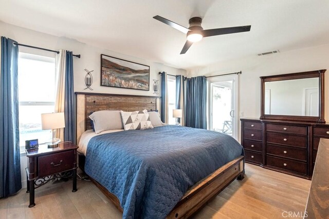 27111 Crews Hill Dr, Menifee, CA 92586 - bedroom featuring light wood-style floors, a ceiling fan, and access to outside