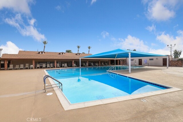 27111 Crews Hill Dr, Menifee, CA 92586 - community pool featuring a patio area