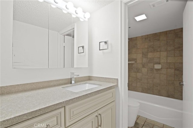35 Linden Ave Unit 504, Long Beach, CA 90802 - bathroom with vanity, a textured ceiling, and shower / bath combination