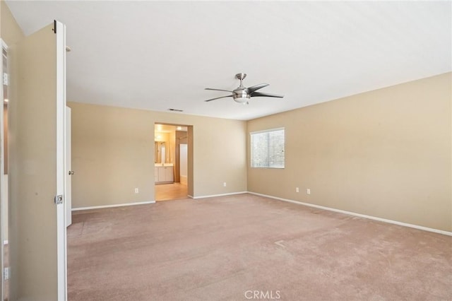 12910 Jersey St, Eastvale, CA 92880 - empty room with ceiling fan and light colored carpet