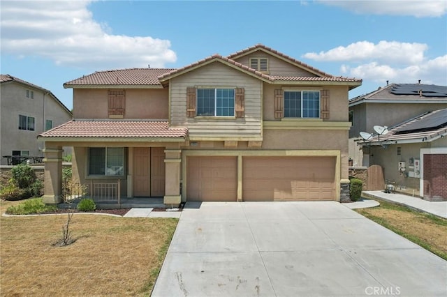 12910 Jersey St, Eastvale, CA 92880 - view of front of house with a tile roof, a porch, a garage, driveway, and stucco siding