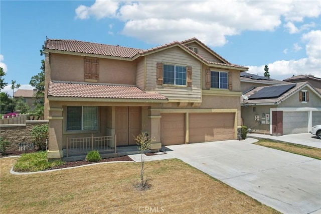 12910 Jersey St, Eastvale, CA 92880 - view of front of home with covered porch, an attached garage, stucco siding, driveway, and a tile roof