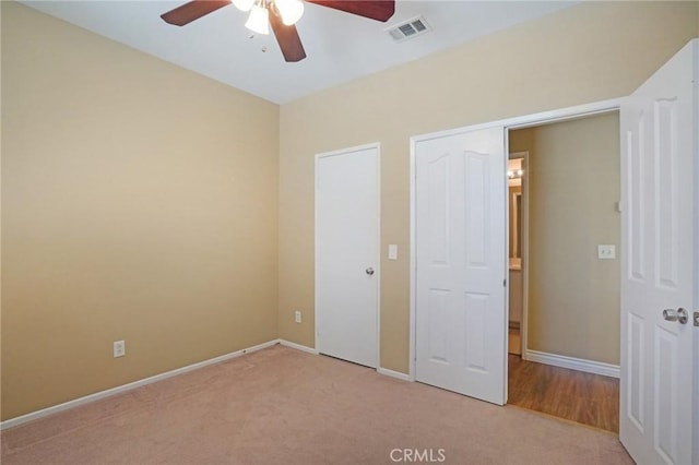 12910 Jersey St, Eastvale, CA 92880 - unfurnished bedroom with light colored carpet and ceiling fan