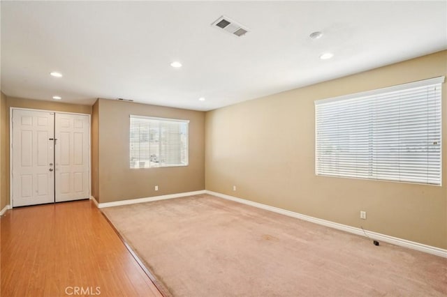12910 Jersey St, Eastvale, CA 92880 - unfurnished bedroom featuring recessed lighting, a closet, and light wood-style floors