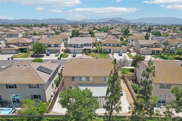 12910 Jersey St, Eastvale, CA 92880 - aerial perspective of suburban area with a mountainous background