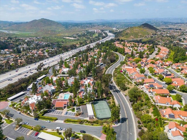 17915 Caminito Pinero Unit 264, San Diego, CA 92128 - aerial view of property and surrounding area with a mountainous background and nearby suburban area