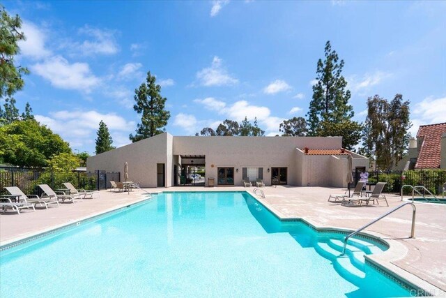 17915 Caminito Pinero Unit 264, San Diego, CA 92128 - community pool featuring a patio