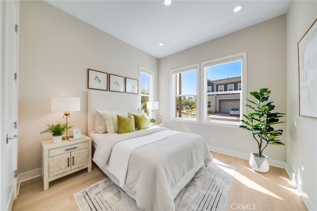 211 Wild Flower, Lake Forest, CA 92630 - bedroom with recessed lighting and light wood-type flooring