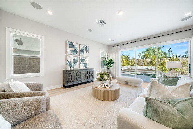 211 Wild Flower, Lake Forest, CA 92630 - living room featuring wood finished floors and recessed lighting