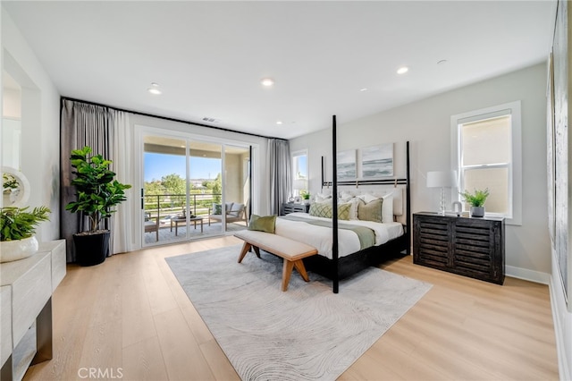 211 Wild Flower, Lake Forest, CA 92630 - bedroom featuring access to exterior, light wood-type flooring, and recessed lighting