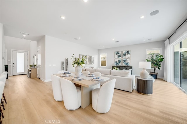 211 Wild Flower, Lake Forest, CA 92630 - dining space with light wood-style floors and recessed lighting