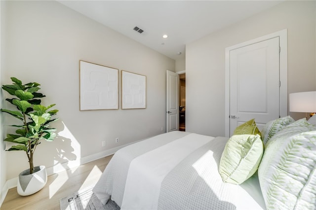 211 Wild Flower, Lake Forest, CA 92630 - bedroom featuring light wood-style flooring and recessed lighting