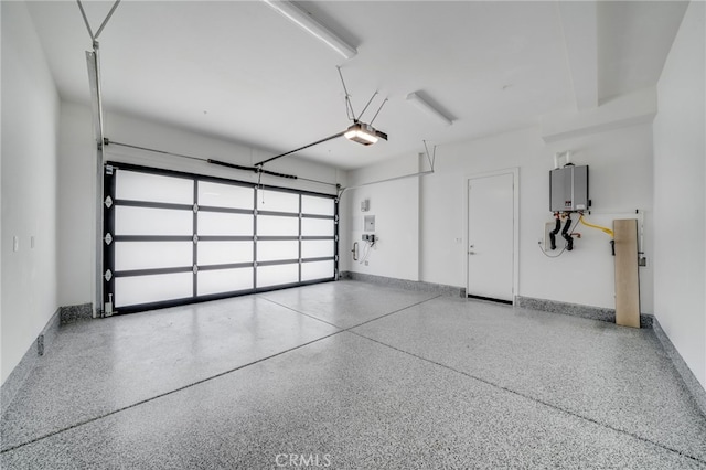 211 Wild Flower, Lake Forest, CA 92630 - garage with a garage door opener and baseboards