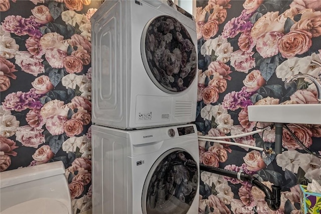 837 N W Knoll Dr Unit 307, West Hollywood, CA 90069 - laundry room with stacked washer and clothes dryer