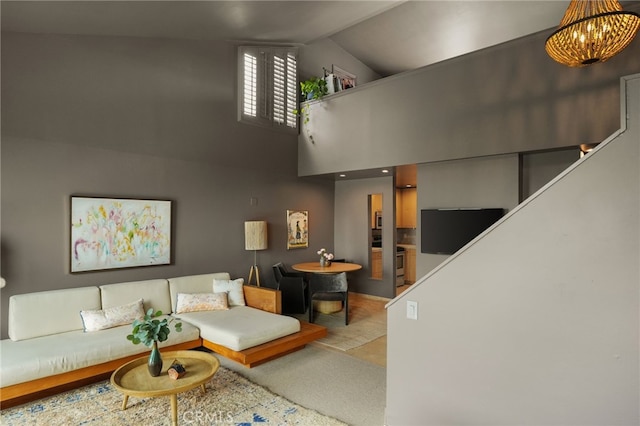 837 N W Knoll Dr Unit 307, West Hollywood, CA 90069 - living area with high vaulted ceiling and stairs