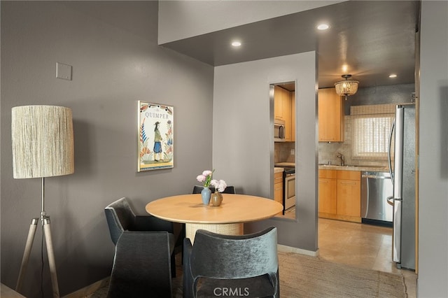 837 N W Knoll Dr Unit 307, West Hollywood, CA 90069 - dining space featuring recessed lighting