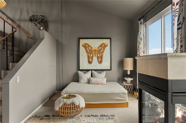 837 N W Knoll Dr Unit 307, West Hollywood, CA 90069 - bedroom with lofted ceiling and carpet floors