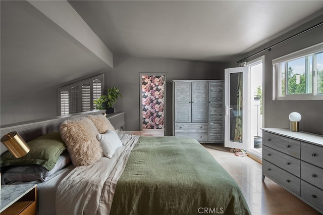 837 N W Knoll Dr Unit 307, West Hollywood, CA 90069 - bedroom with vaulted ceiling and access to exterior