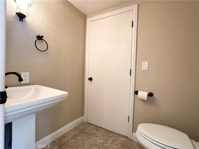 2817 San Verbena Way, Chico, CA 95973 - bathroom featuring tile patterned floors and a textured wall