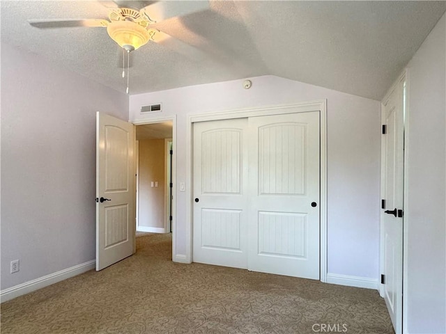 2817 San Verbena Way, Chico, CA 95973 - unfurnished bedroom with carpet floors, a closet, a textured ceiling, vaulted ceiling, and a ceiling fan